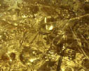 Menschliche Spuren - Augenblicke in Gold. Detail des Eingangfelds der Ausstellung 'Werkschau' im Kunstverein Steyr, 2000